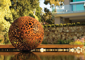 Delicate Corten Steel Carved Hollow Ball Sculpture For Garden Decoration